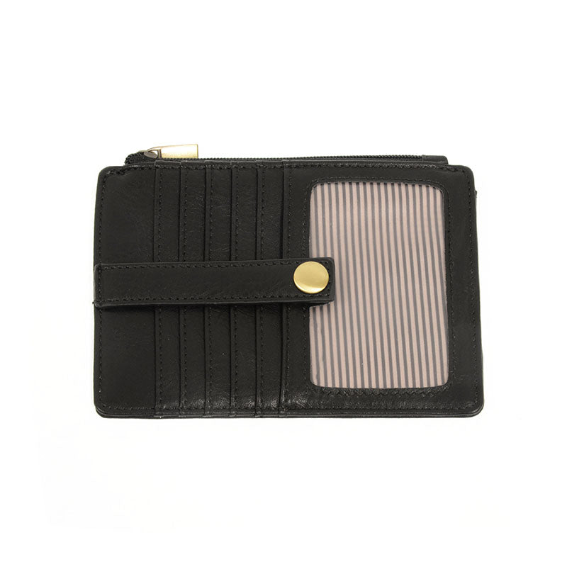 A black vegan leather mini travel wallet with a top zip closure, multiple card pockets, an ID window pocket, and an exterior passport pocket. It has brass plated hardware and is slim enough for travel use.