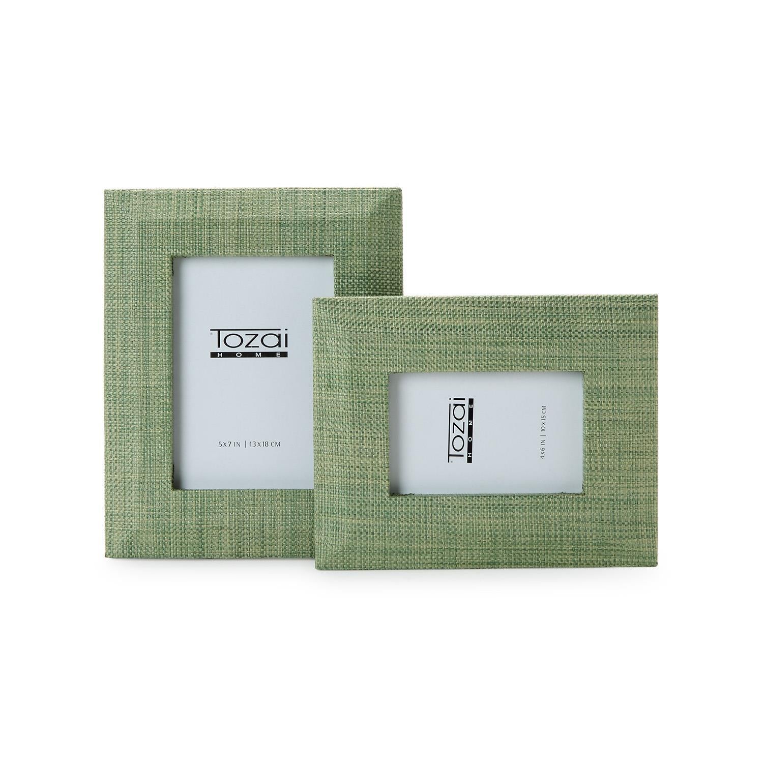 Two green fabric picture frames with 'Tozai' branding on a white background