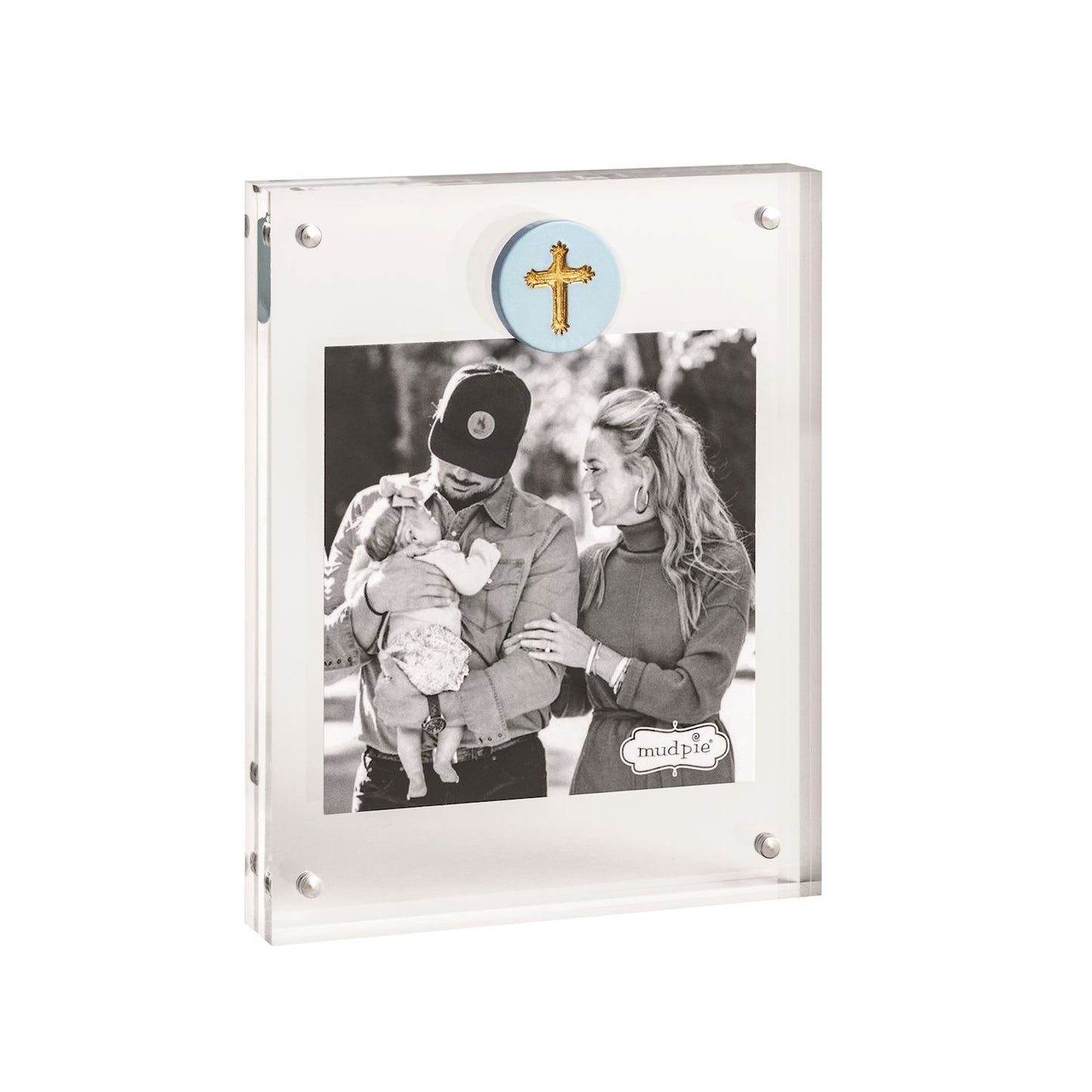   Clear acrylic picture frame by mudpie with a blue circle toward the top of the picture enclosing a gold cross. 