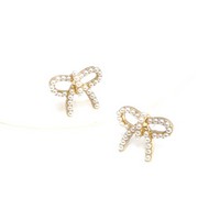 Meghan Browne Peach Pearl Bow Earrings