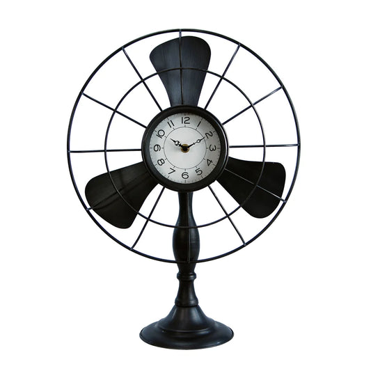 Decorative table clock designed like a vintage fan on a white background