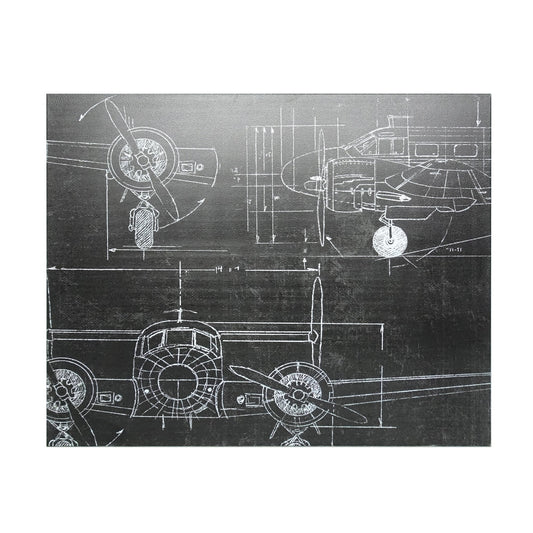 metal wall art featuring vintage airplane blueprint schematics in white lines on a dark charcoal background.