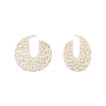 Pierce and Hide Pair of creame and gold hoop earrings with a textured design on a white background