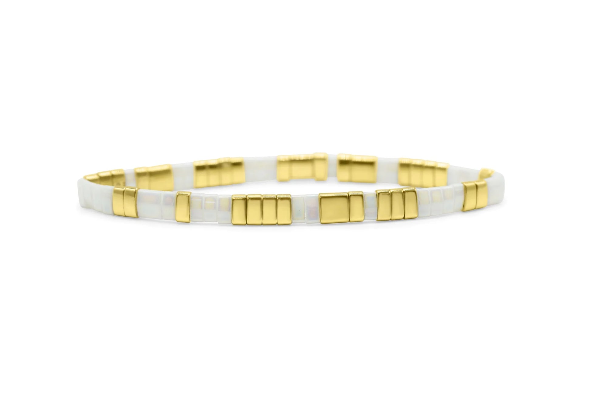 Bracelet with gold and white square beads on a white background