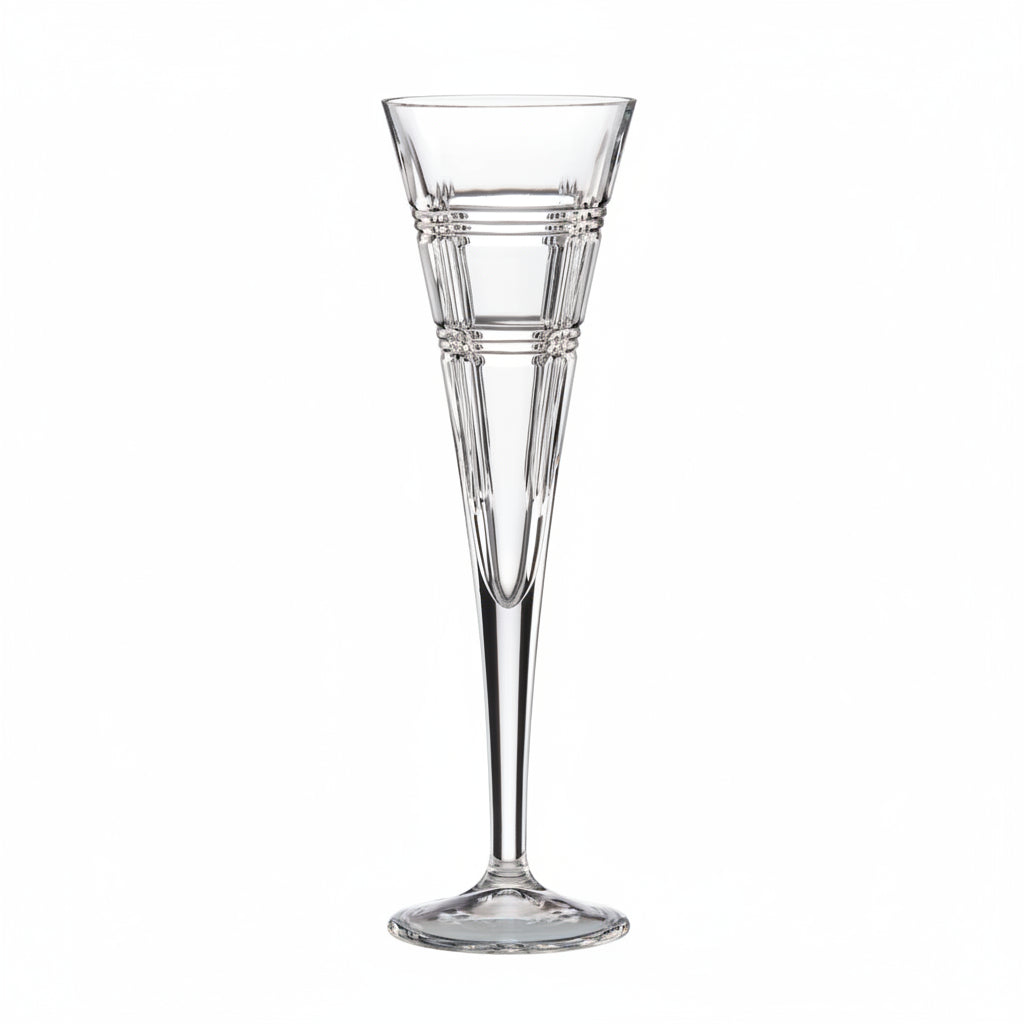 A clear lenox  glass champagne flute on a white background