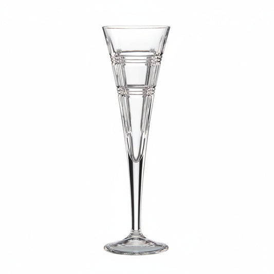 A clear lenox  glass champagne flute on a white background
