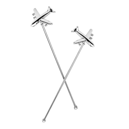 Two silver drink stirrers with airplanes on toop.