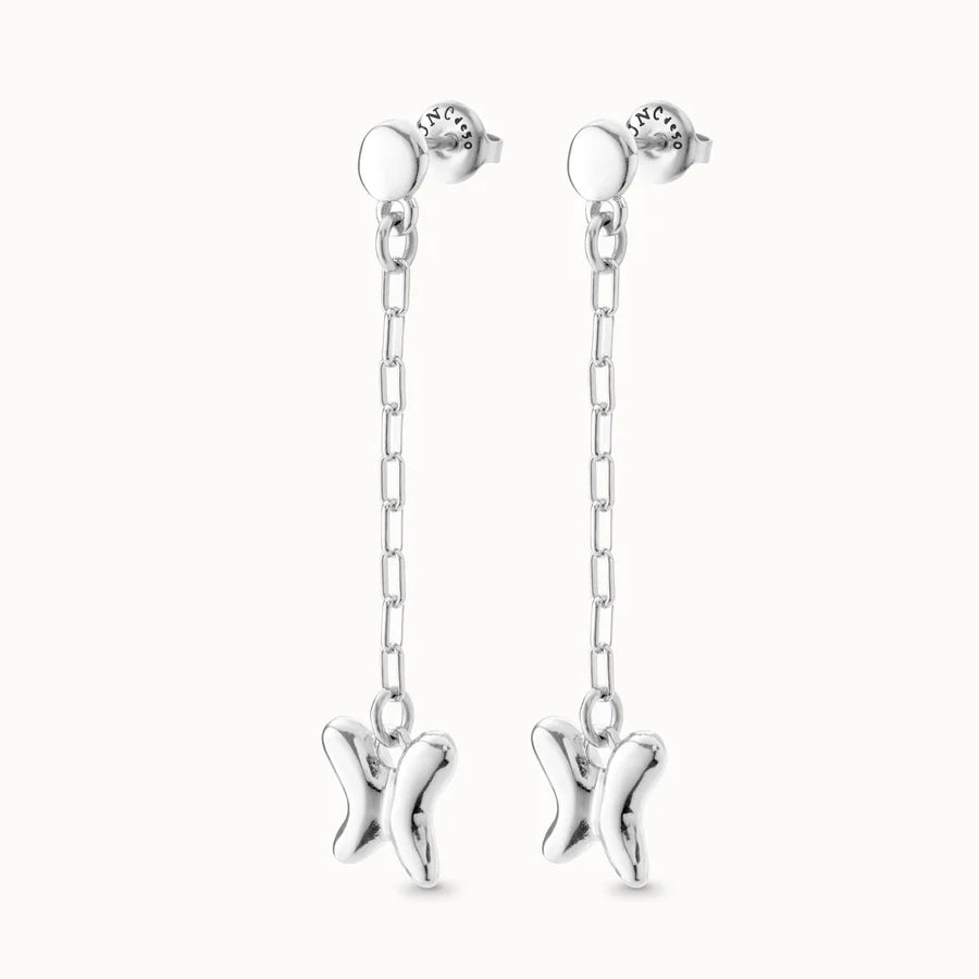 Side view of UNOde50 Wings Silver Dangle Butterfly Earrings with back on white background