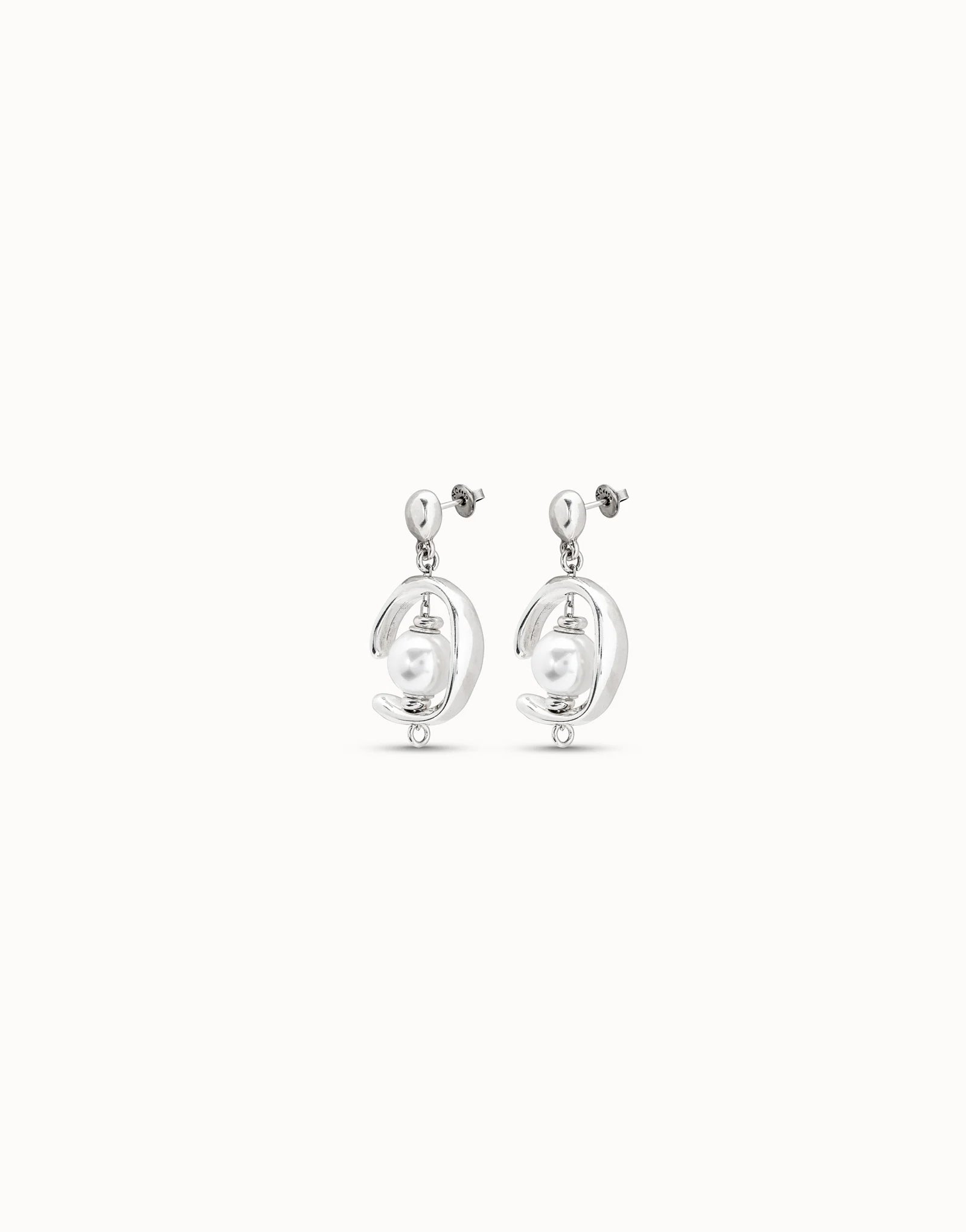 Pair of UNOde50 Inorbit Silver Drop Earrings with Pearls and earring backs on a white background