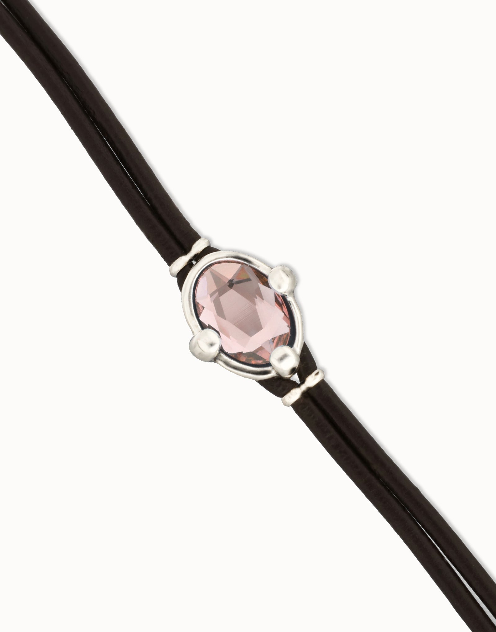 Black leather UNOde50 bracelet  with a pink gemstone and silver accents on a white background
