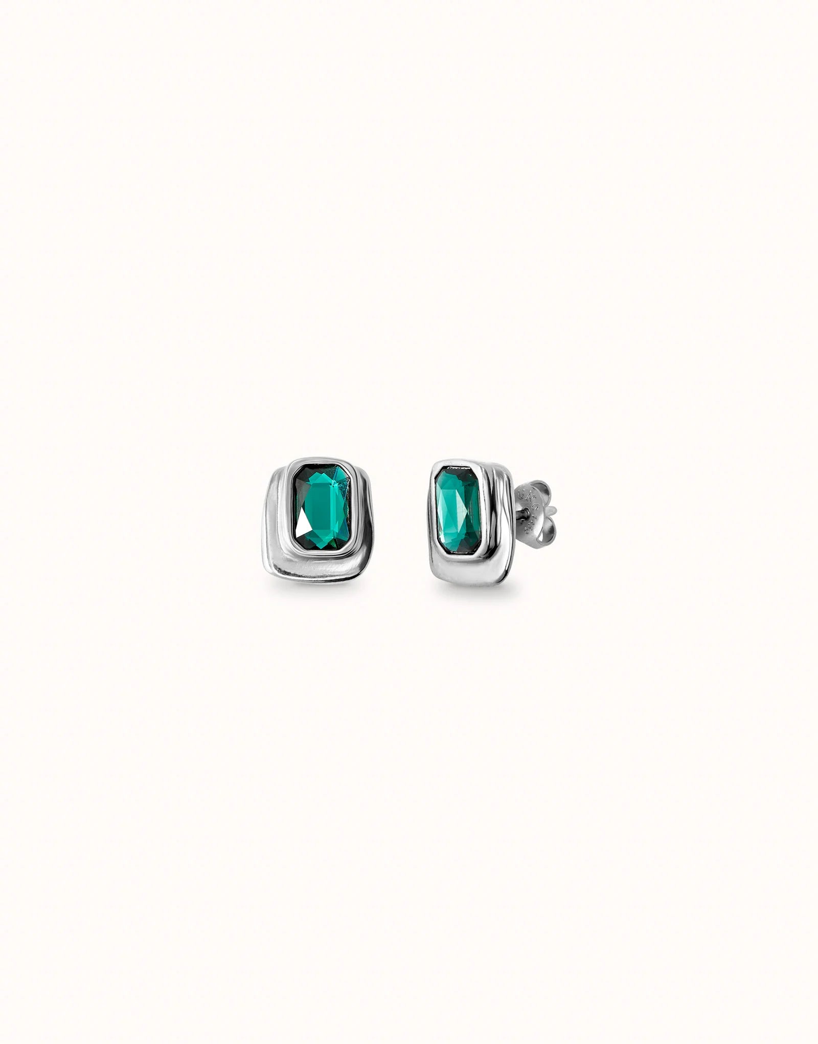 UNOde50 Ser Magnetica Silver Earrings with Green Crystal on a white background