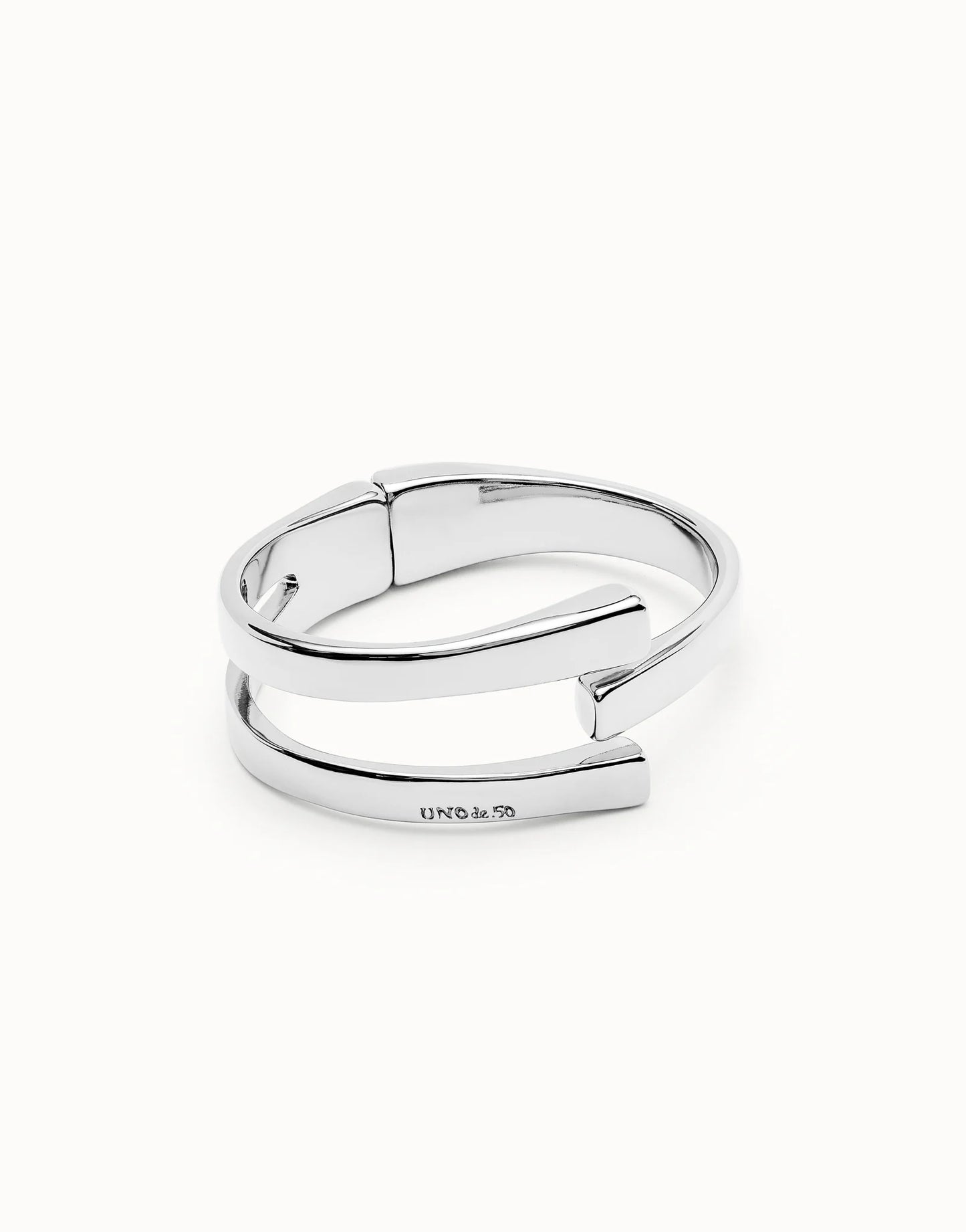 UNOde50 Ser Original Silver Bangle Bracelet with intertwining metal pieces on white background