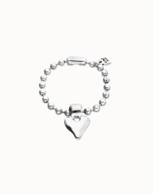 Silver UNOde50 bracelet with heart-shaped charm on a white background