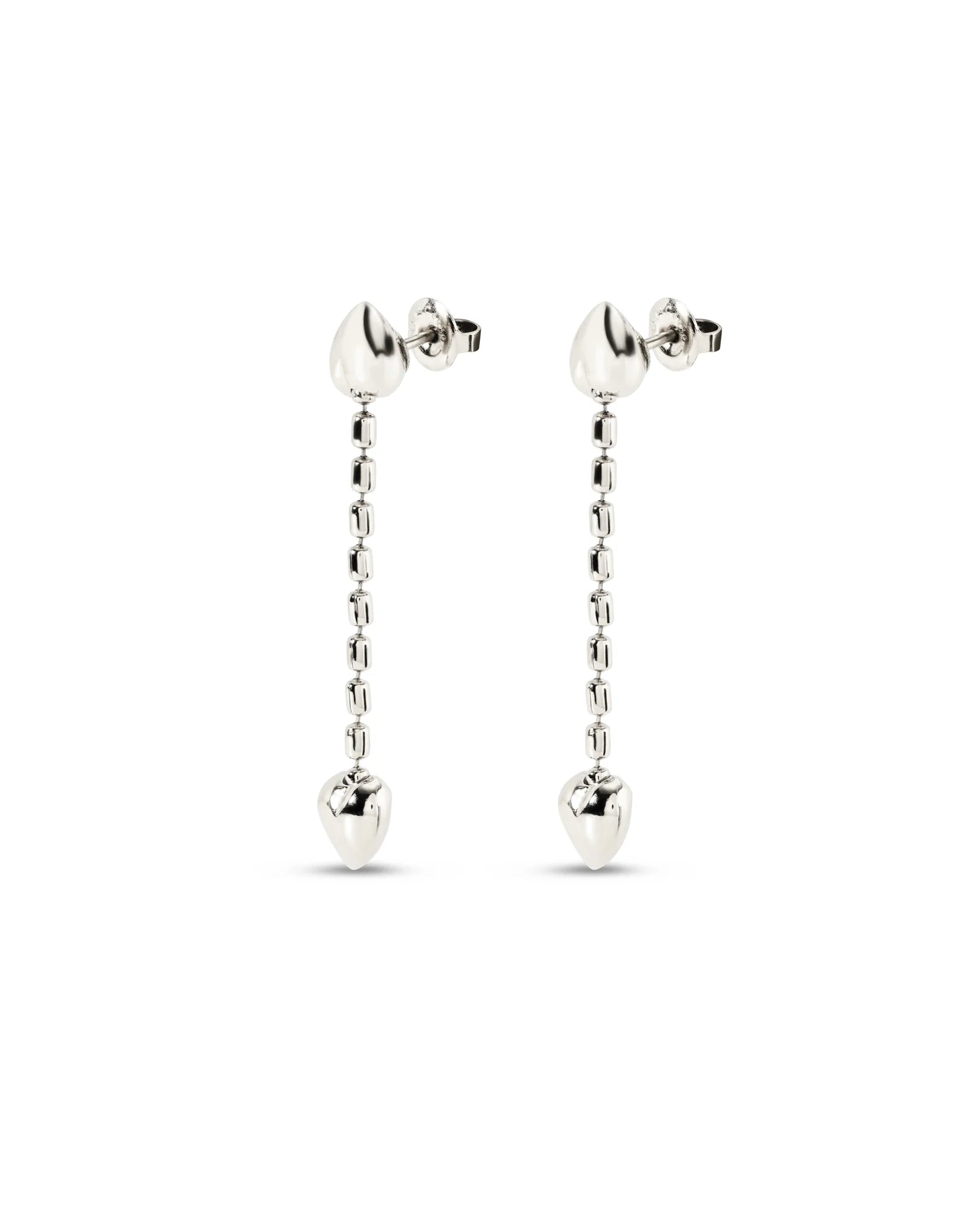 Side view of UNOde50 Cupido Silver Drop Chain Earrings with a Small Heart and earring backs on a white background