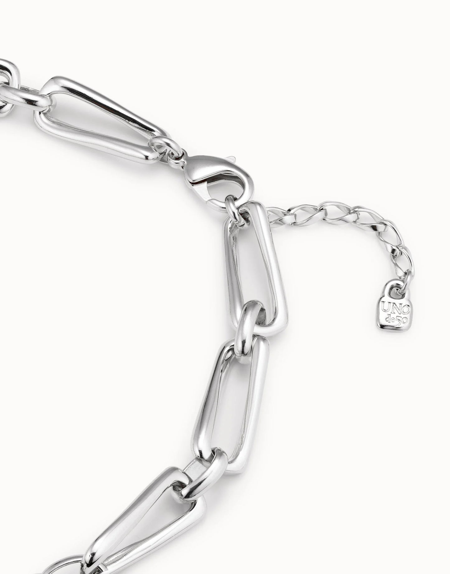 Lobster Clasp with UNOde50 signet on a Galaxy Silver Chain Link Necklace with white background