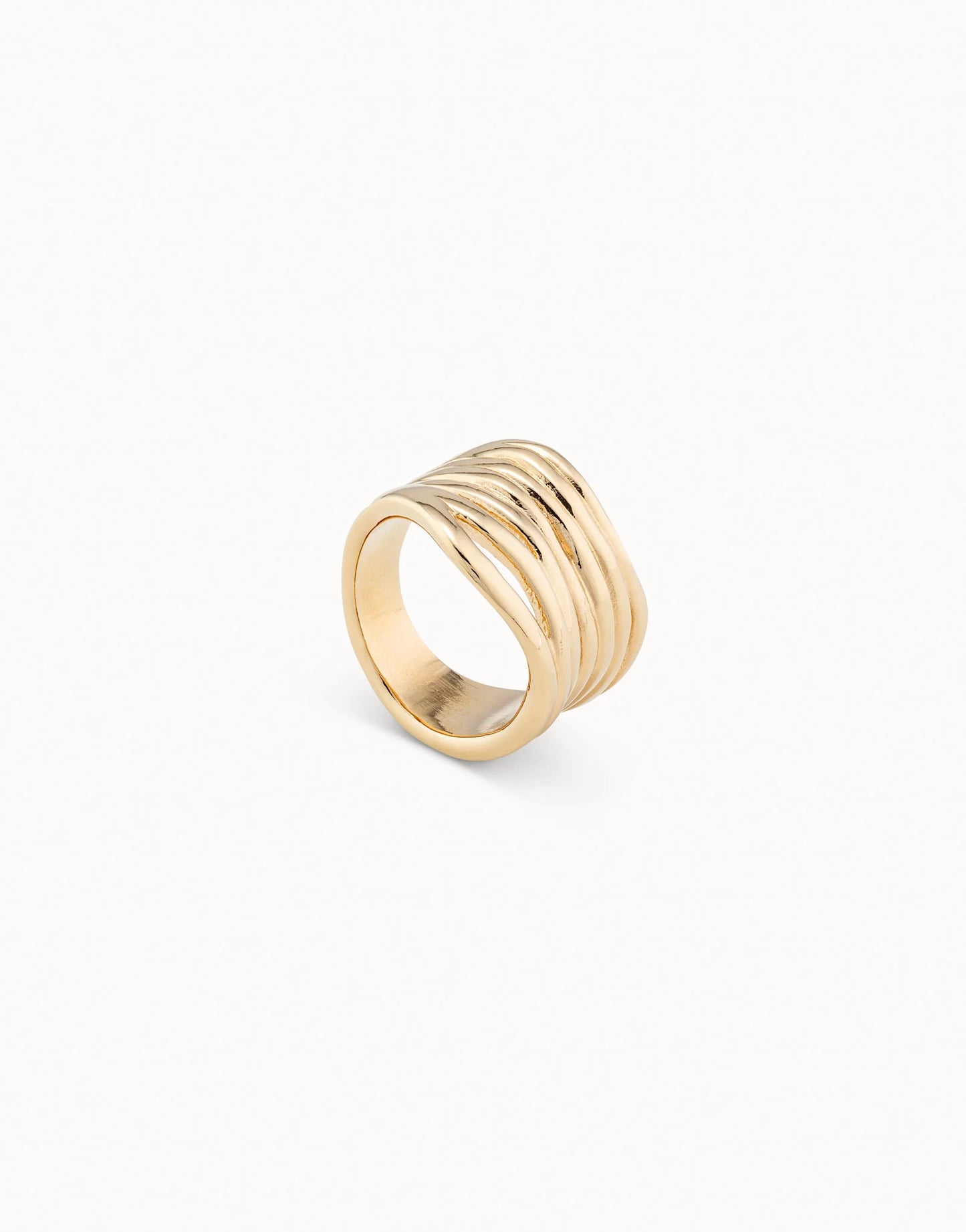 UNOde50 Nihiwatu Beach Gold Stacked Ring with multiple bands on a white background