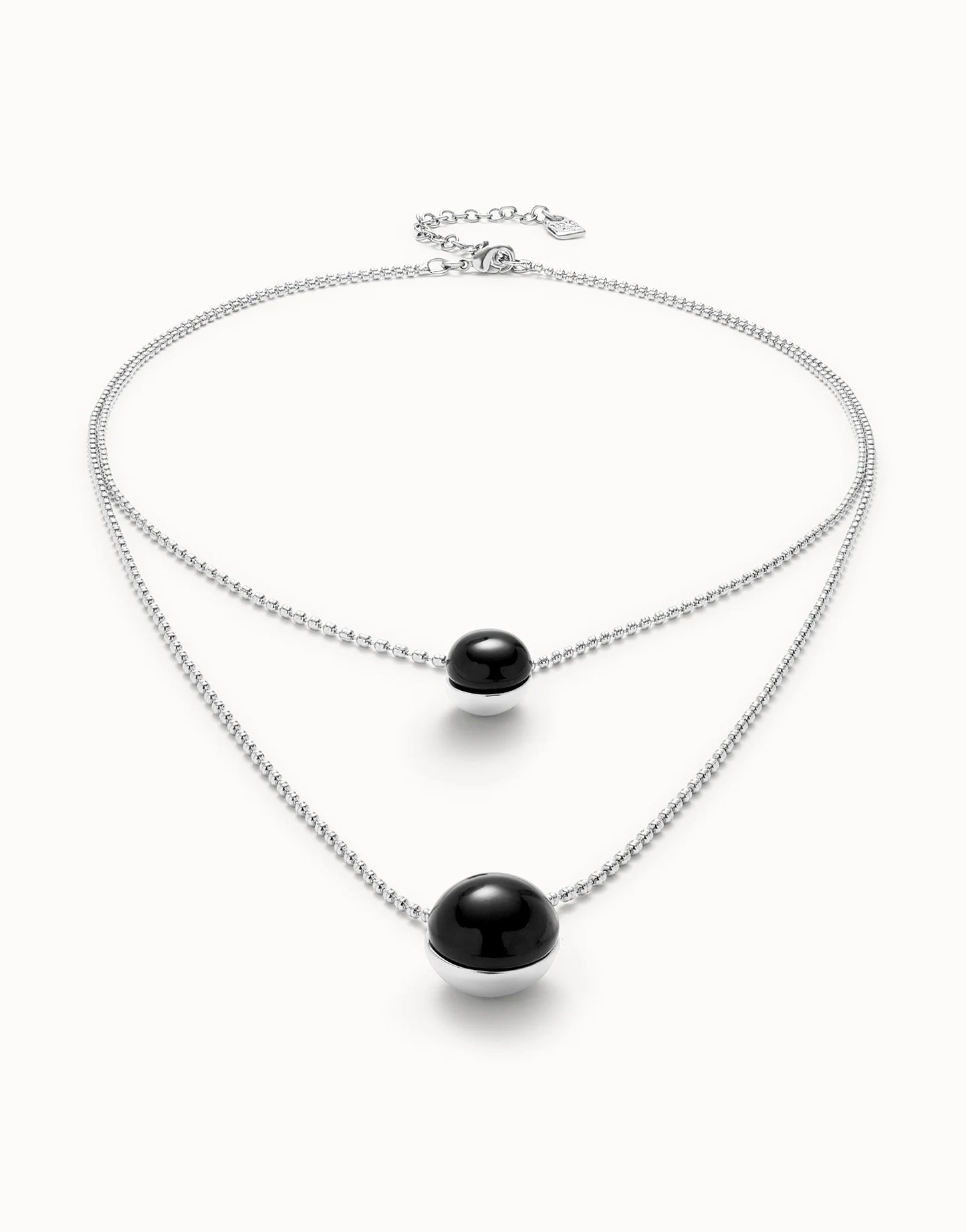 UNOde50 Ser Fascinante Silver Double Necklace with Black Murano Glass Pendants on a white background