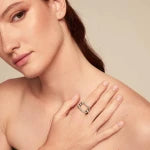 Woman wearing a UNOde50 Serotonin Silver Ring
