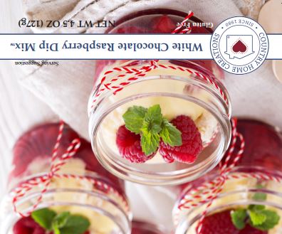 Mason jars filled with a white chocolate raspberries dip mix