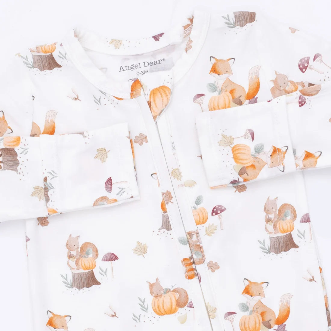 A baby long-sleeve Angel dear woodland animals with pumpkin footie with a white background and a cute autumn forest print featuring foxes, squirrels, pumpkins, and leaves. The brand name 'Angel Dreams' is visible on the inner neck label.