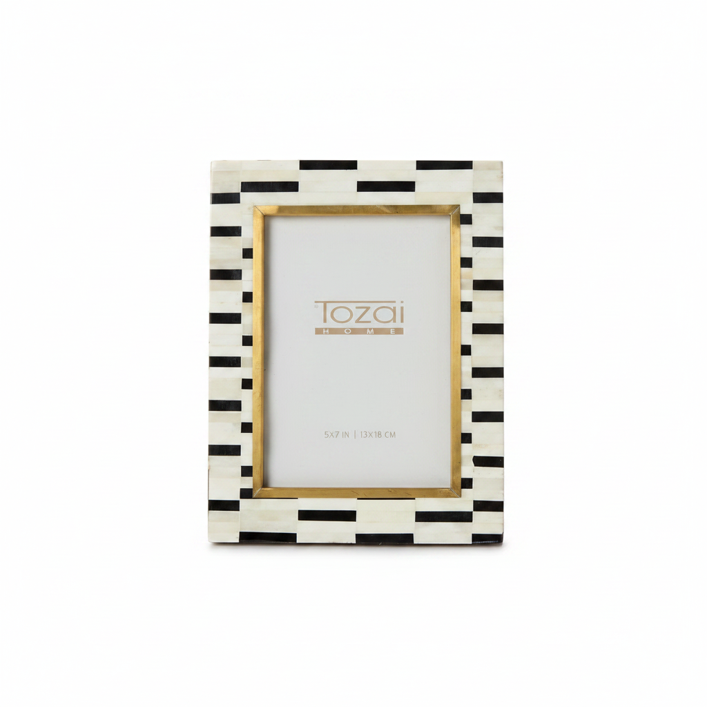 Picture frame with black and white striped design on a white background