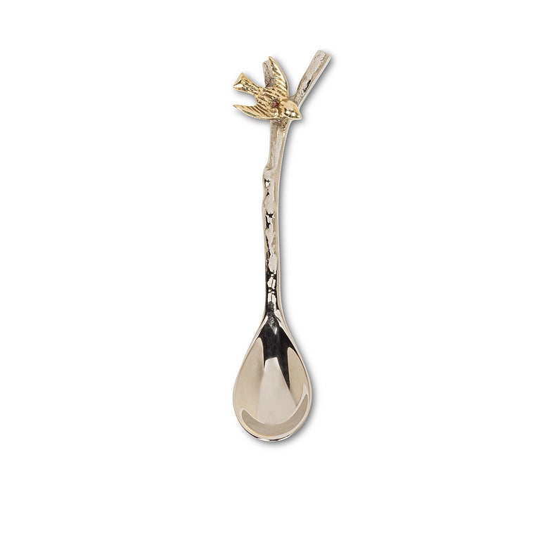 Decorative spoon with a handle with a brass bird on a silver branch