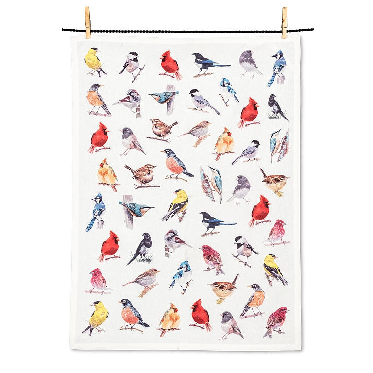 A white tea towel with a colorful watercolor print of various North American birds, hanging from a black clothesline with two wooden clothespins against a plain white background.
