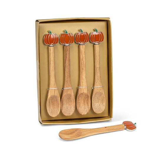 Four wooden serving spoons with orange pumpkin-shaped handles are displayed in a tan gift box, with one spoon placed in front on a white background.
