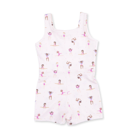 child's light pink activewear tumble suit with illustrations of girls in various tumbling moves