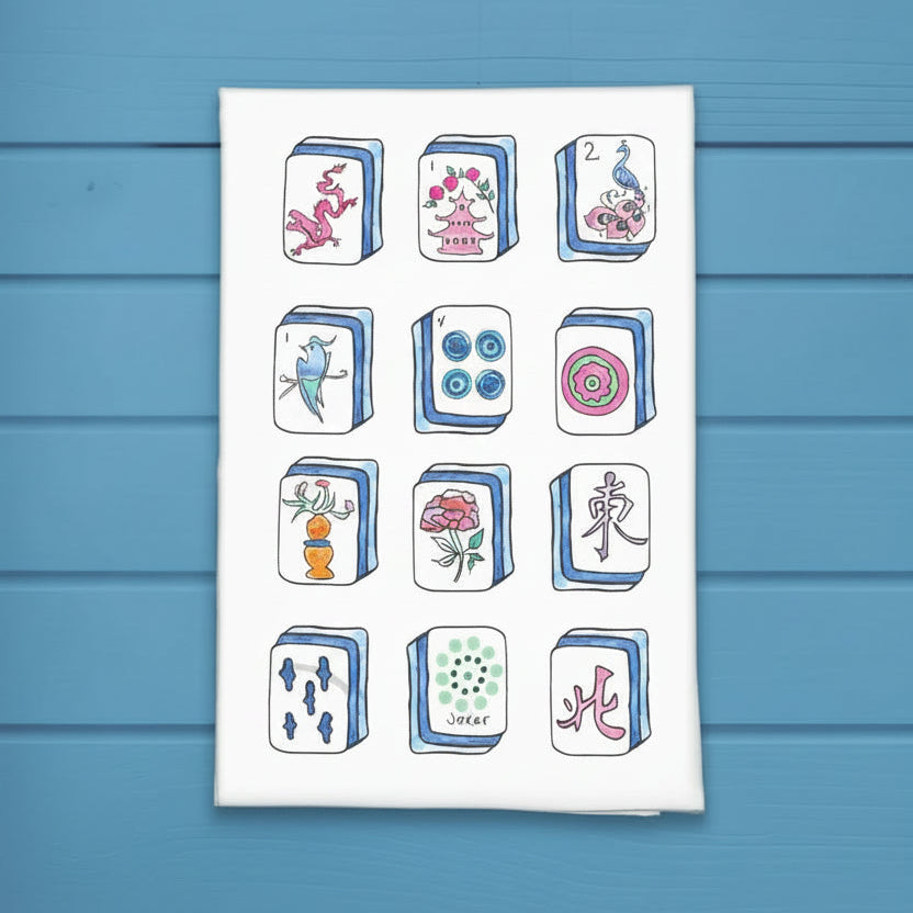 cotton dish towel with mahjong tiles in blues and pinks