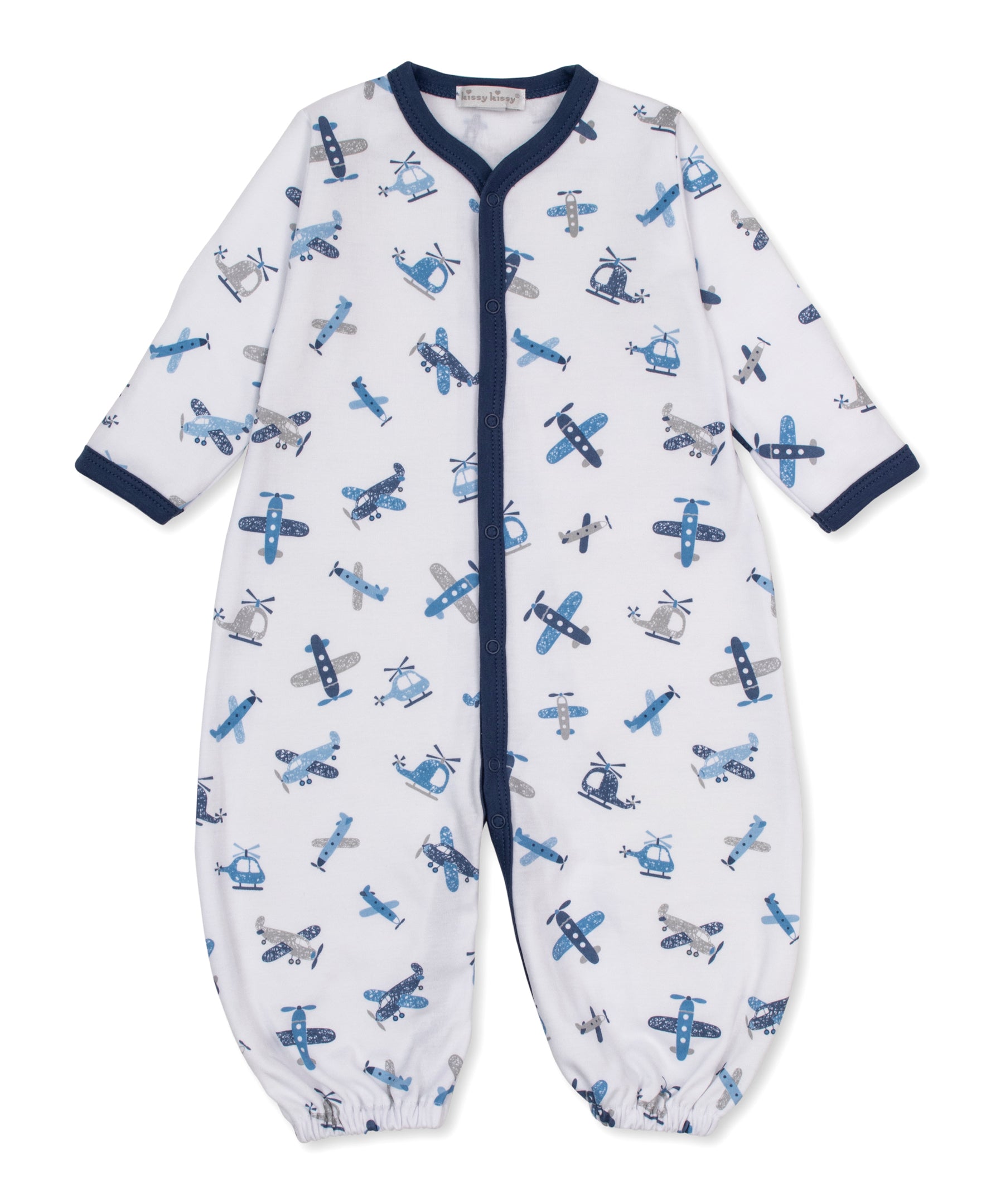 A baby footed sleeper in white with a blue and gray airplane print, featuring a navy blue collar, cuffs, and front snaps.