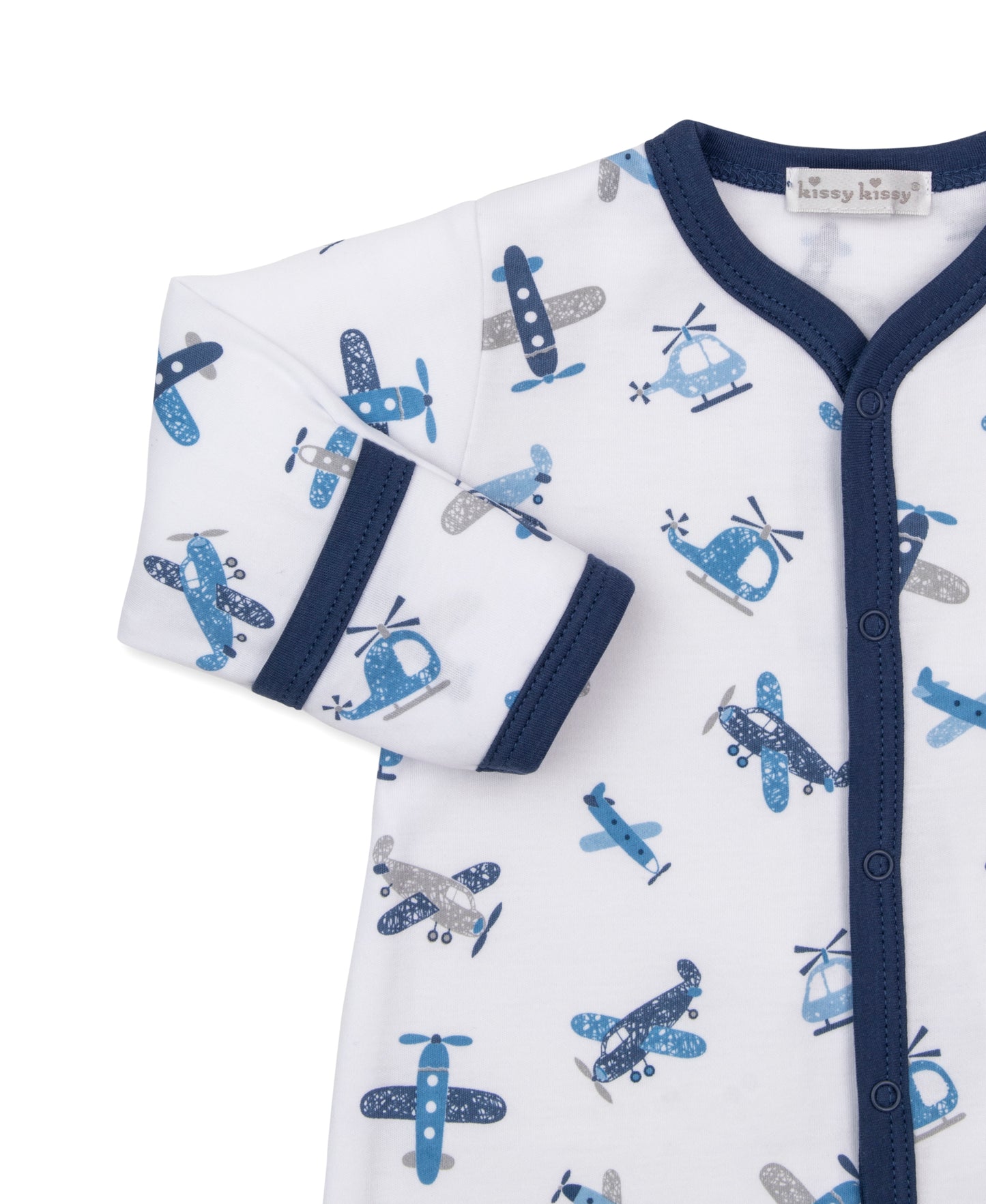 A baby long-sleeve sleep sack with an all-over blue and gray airplane and helicopter pattern on a white background, featuring dark navy blue trim along the collar, cuffs, and button-front placket.
