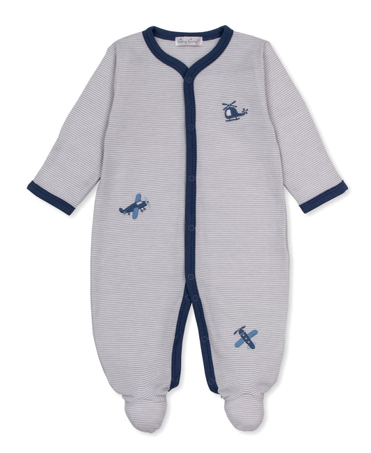 A baby footed sleeper in light gray and white stripes with navy blue trim and embroidered blue airplane motifs.