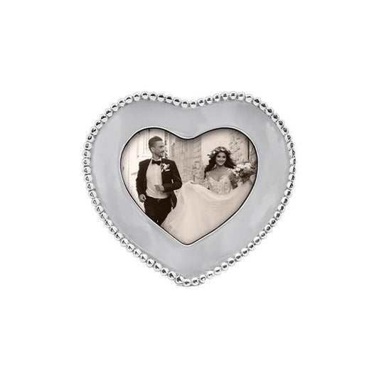 Heart-shaped photo frame with a beaded edge by mariposa 