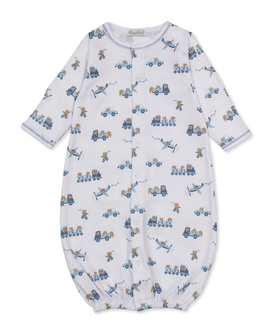 convertible gown with a white background and a blue and tan print featuring bears riding various forms of transportation.