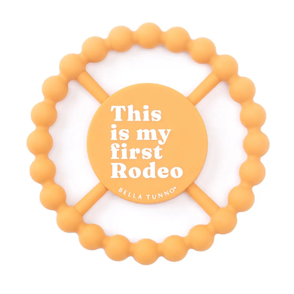 bella tunno orange beaded teether with text this is my first rodeo