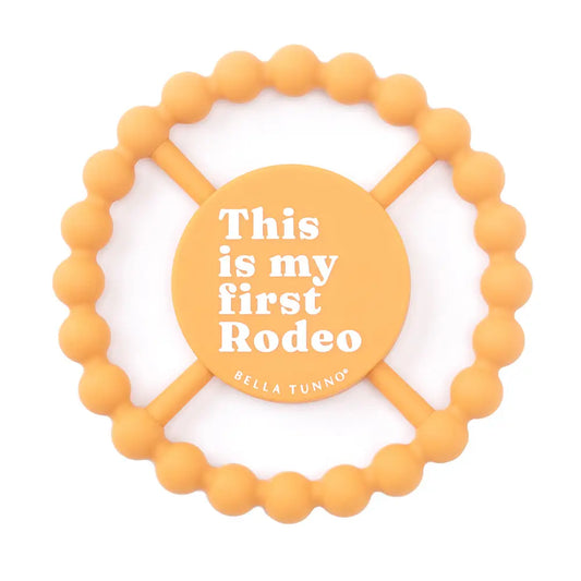 bella tunno orange beaded teether with text this is my first rodeo