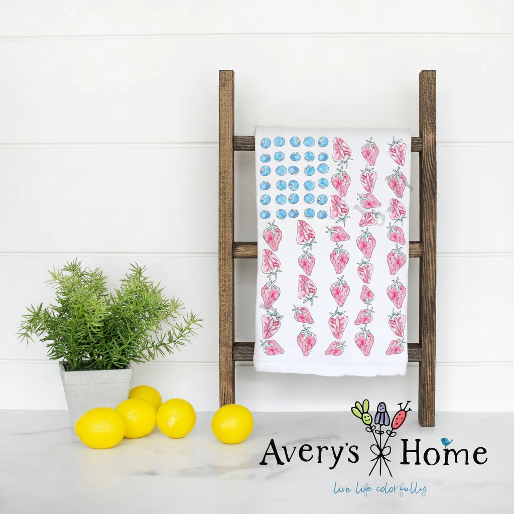 tea towel with blueberries and strawberries in the design of an American flag