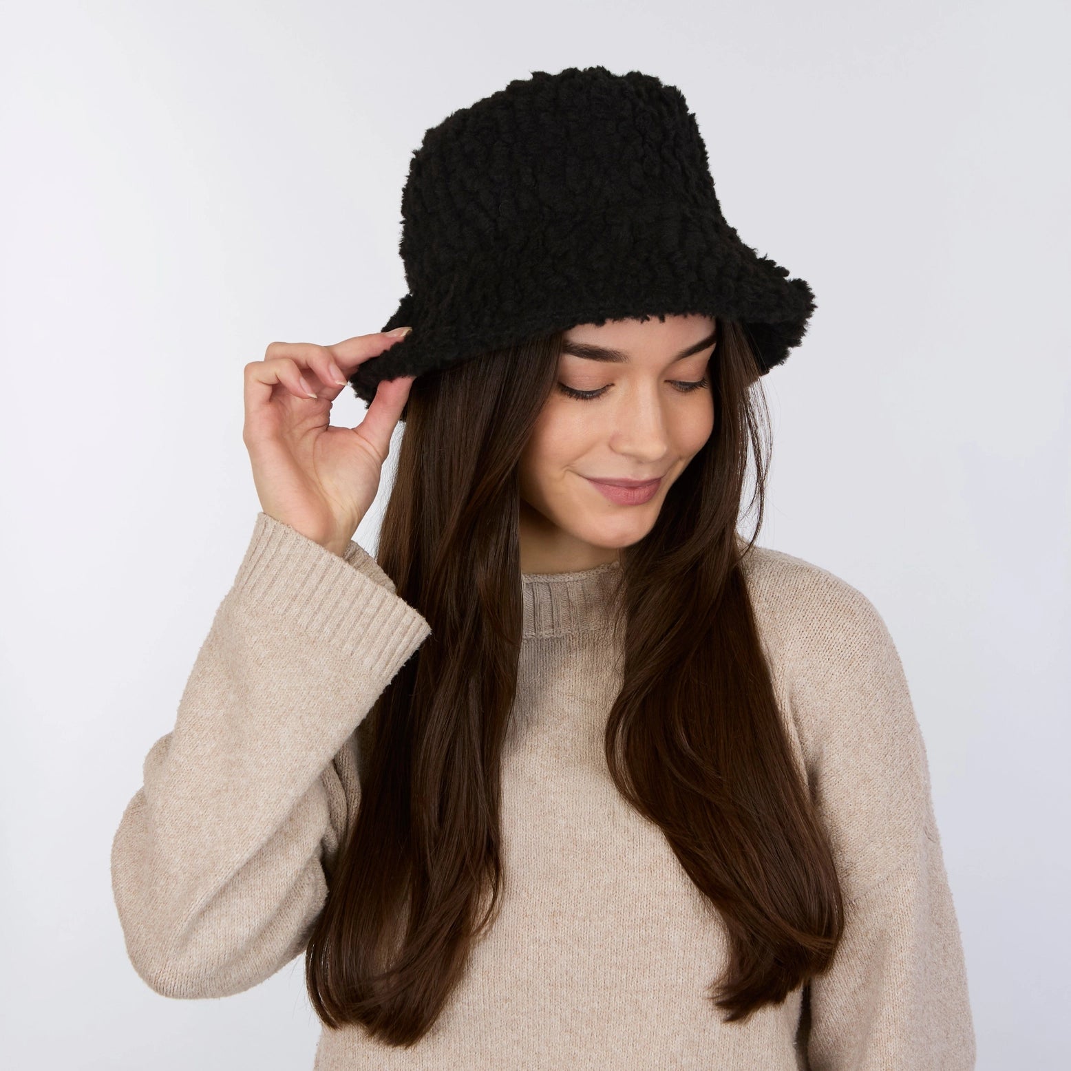 black bucket hat with a sherpa texture