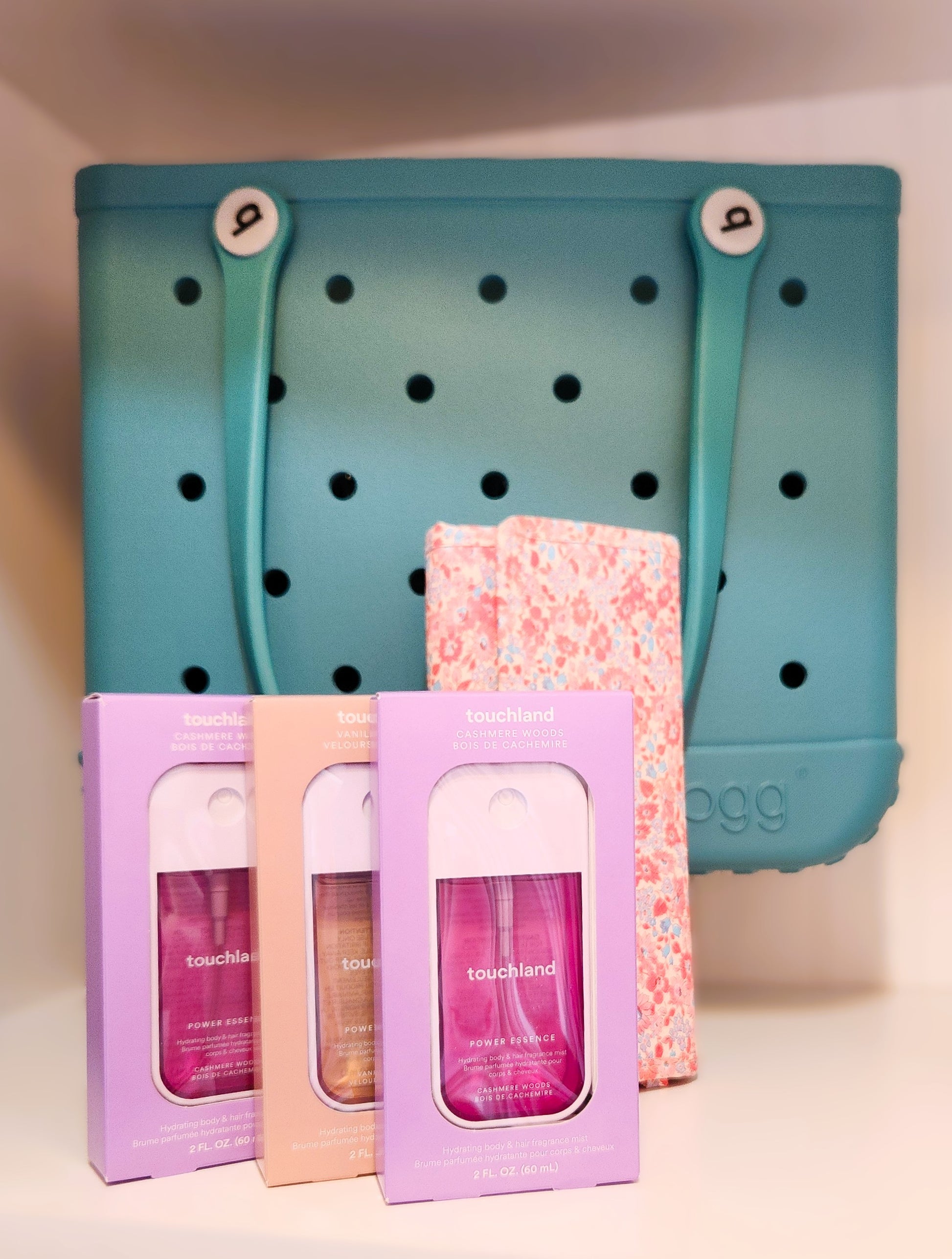 Three touchland hand sanitizers with a baby turquoise bogg taken at the Little Exchange