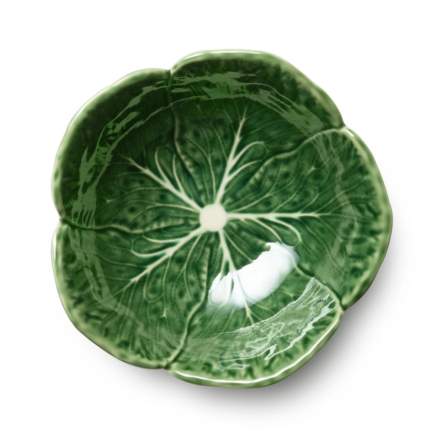 Green ceramic cereal bowl shaped like a cabbage leaf on a white background