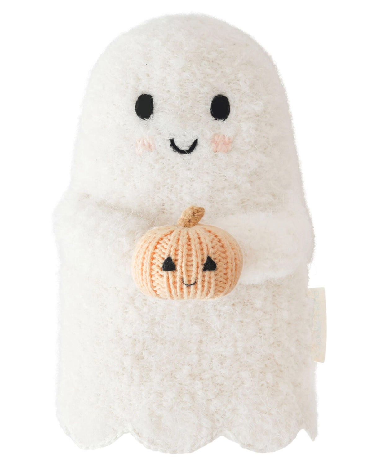 A white plush ghost toy holding a small orange knitted pumpkin with a smiling face, shown against a plain white background.