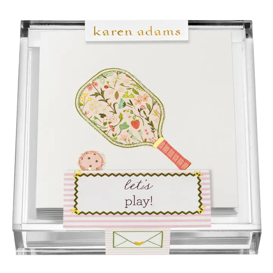 Note card set with floral paddle design and 'let's play!' text, brand 'karen adams' visible.