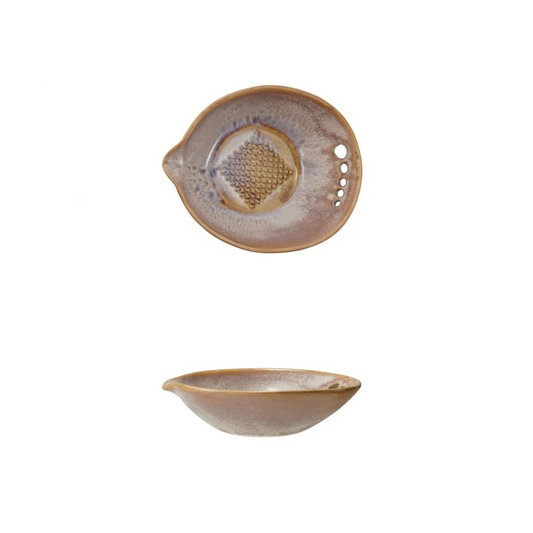 stoneware ginger grater in a brown glaze with a rough bottom