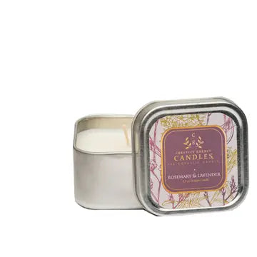 Rosemary and Lavender lotion Candle in a tin with a decorative label on a white background