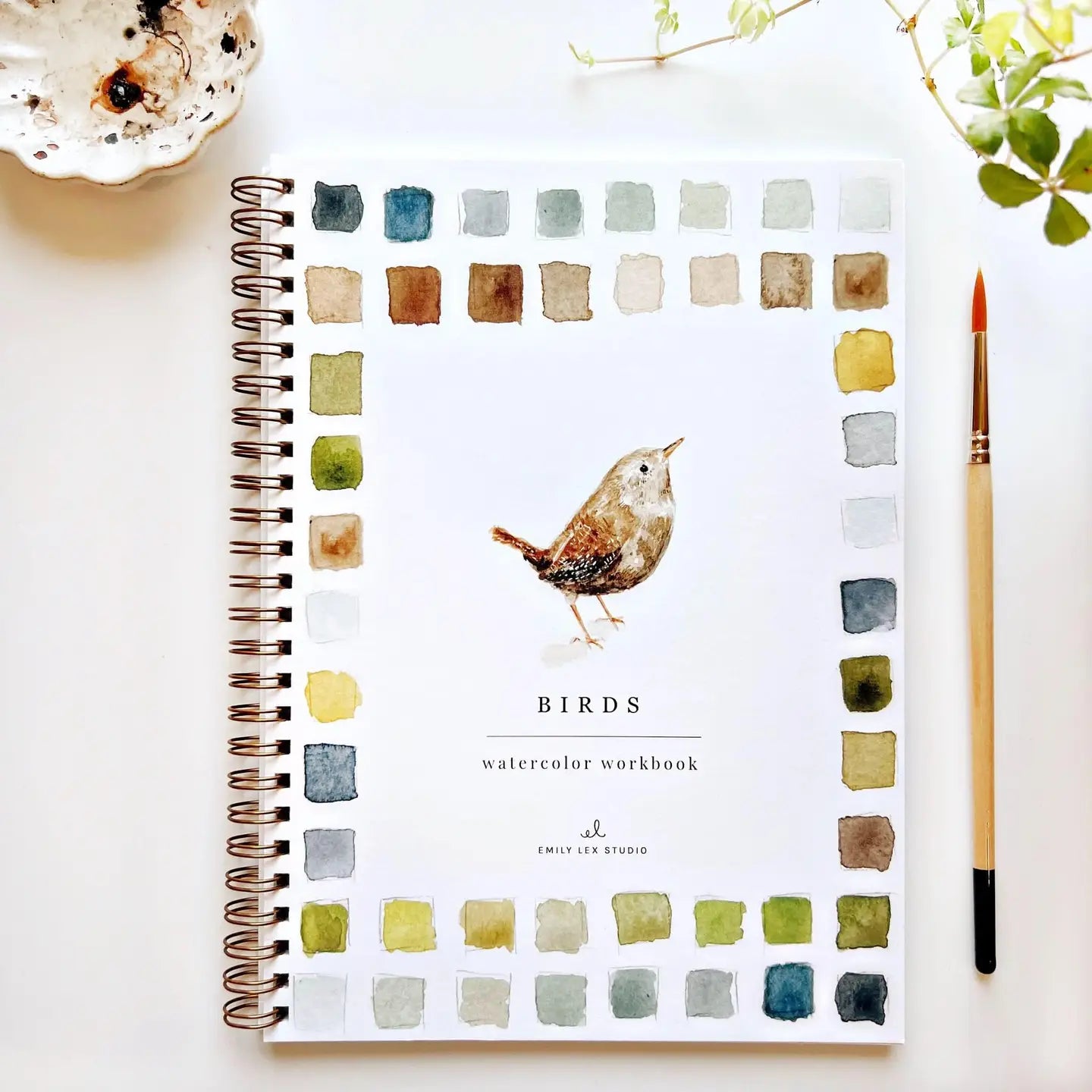Watercolor workbook titled 'Birds' with a bird illustration on a white background