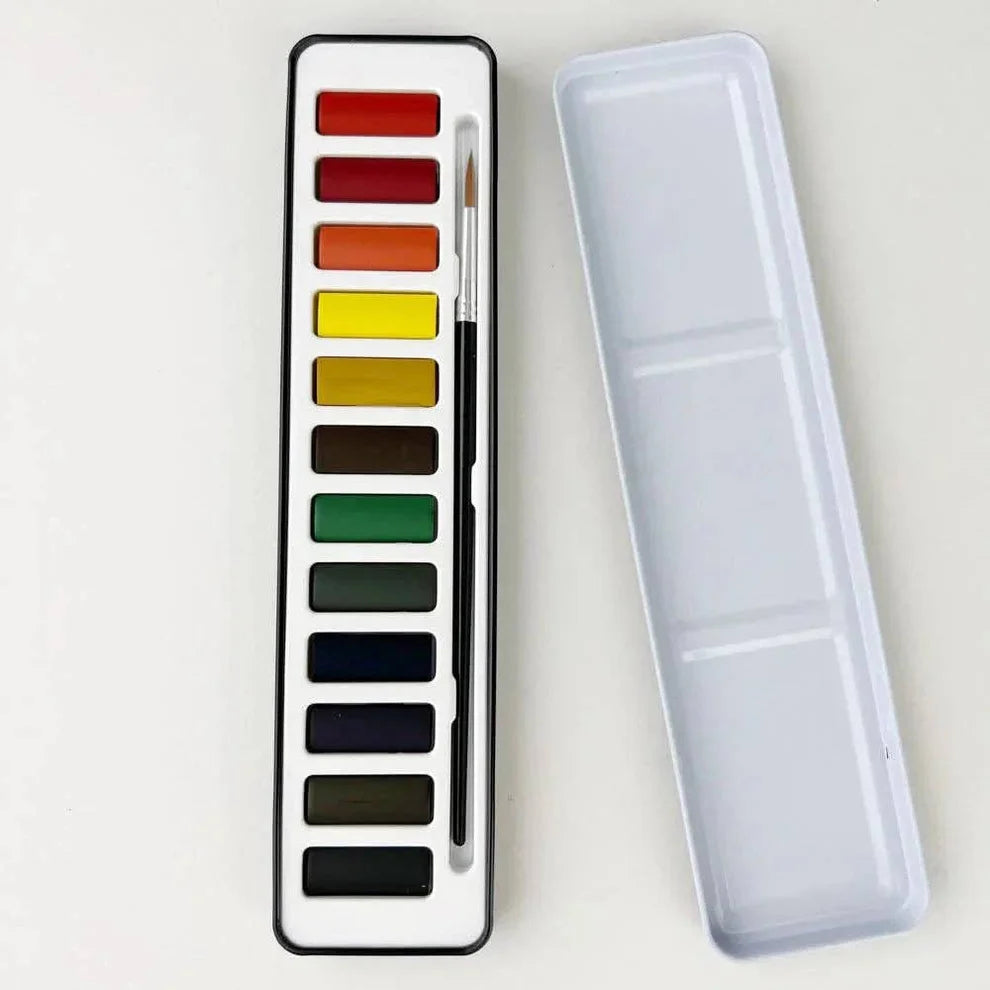 Set of 12 watercolor paints with a brush in white and black case