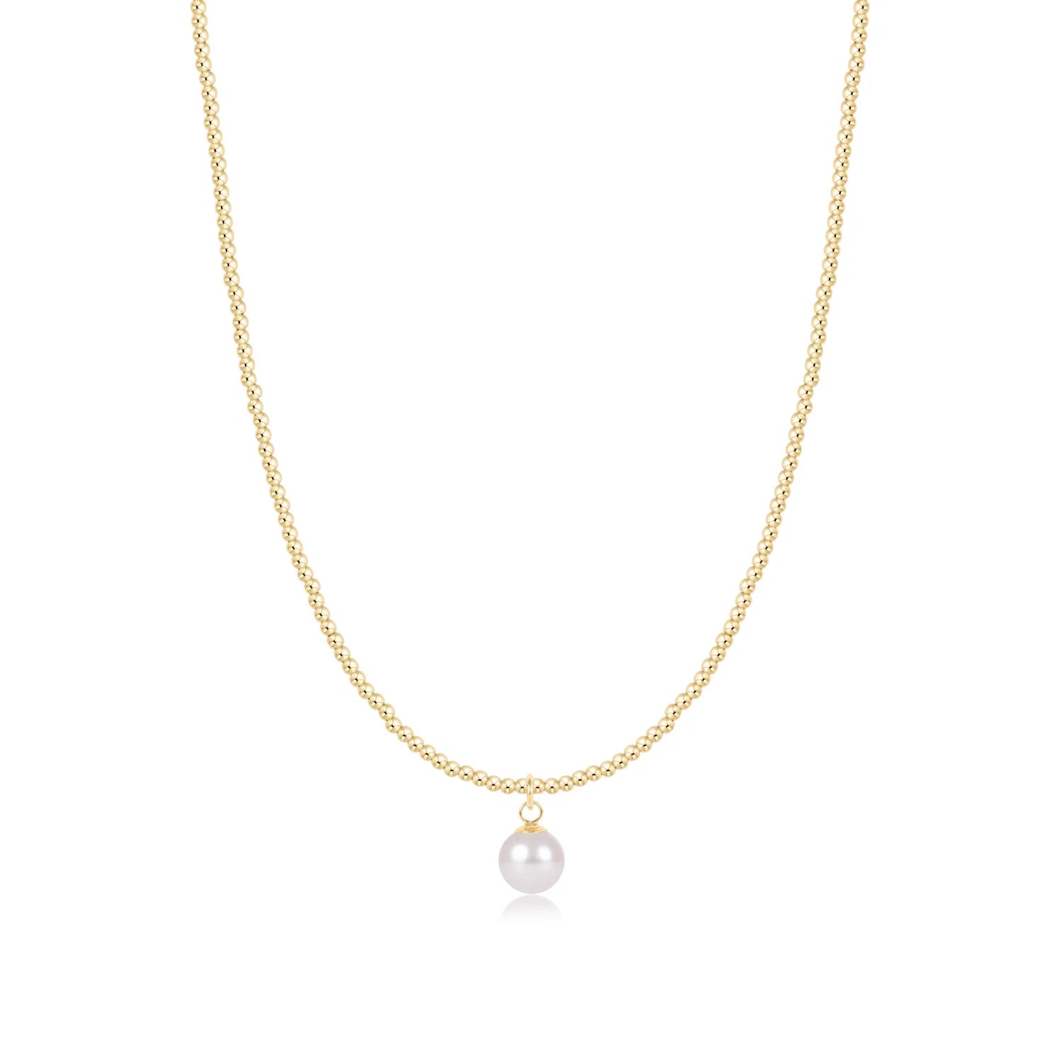 A delicate enewton classic gold 2mm beaded necklace featuring a single, lustrous 8mm white pearl pendant, displayed against a clean white background.
