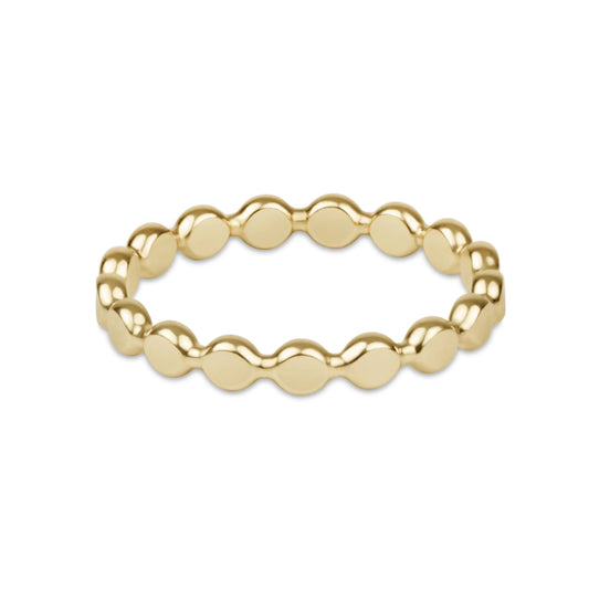 A classic enewton gold beaded stretch band ring with a wavy, scalloped edge design,  flatten discs shown on a clean white background.