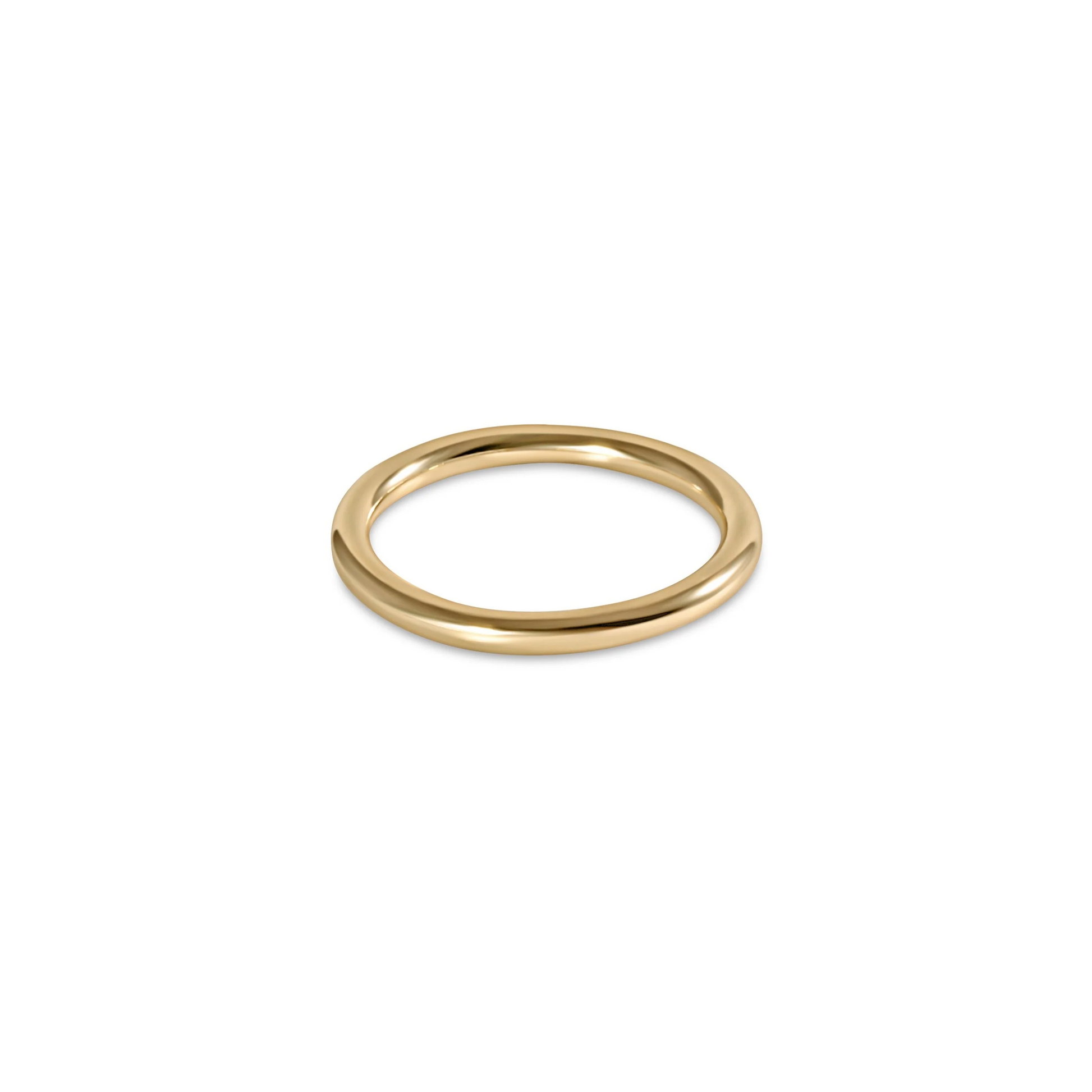 A simple gold enewton band ring with a smooth finish.
